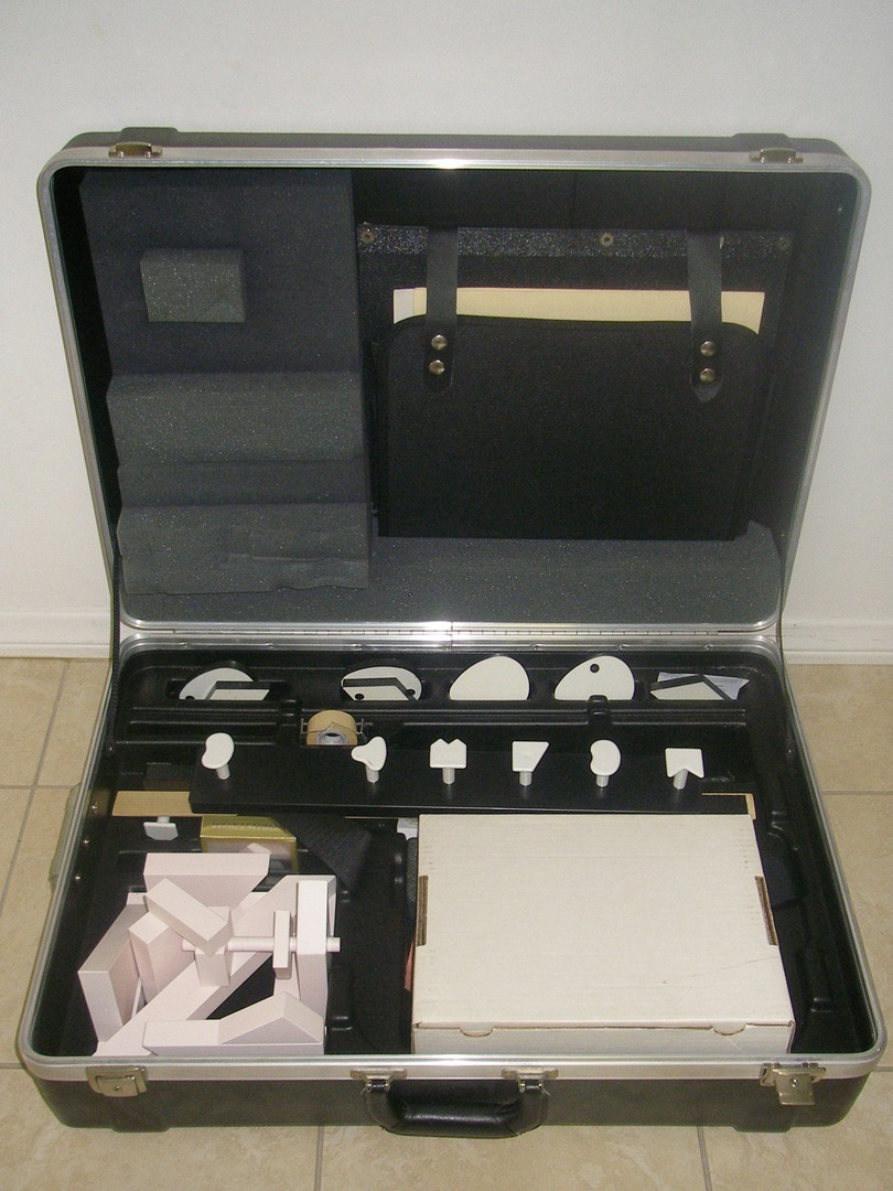 A suitcase with many items inside of it